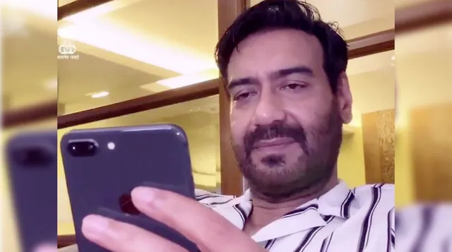 Carte meme Ajay Devgn Looking At His Phone