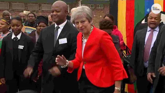 Dancing Theresa May meme card