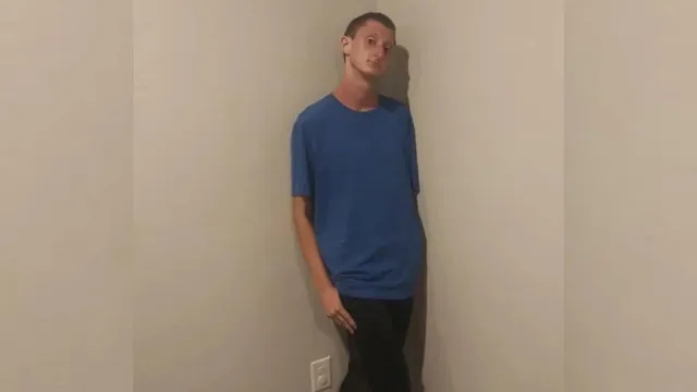 Daniel Larson Standing In A Corner meme card