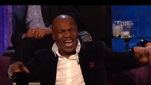 Meme Mike Tyson laughing