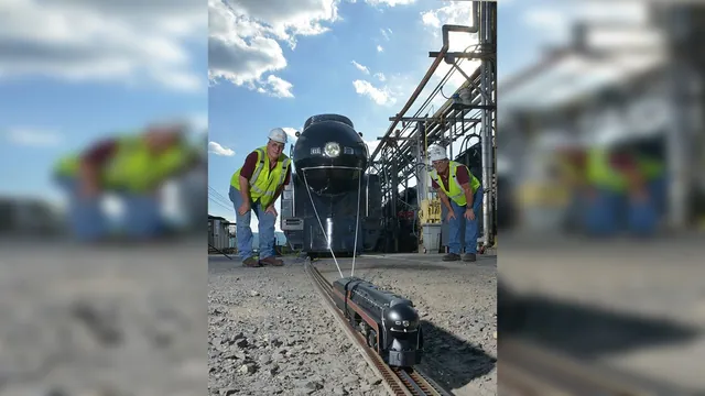 Small Train Pulling Big Train meme card