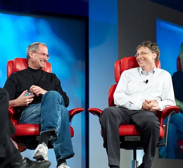 Steve Jobs vs. Bill Gates meme card