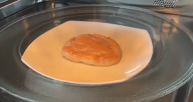 Throwing a Microwaved Honey Bun at a Homeless Man meme card