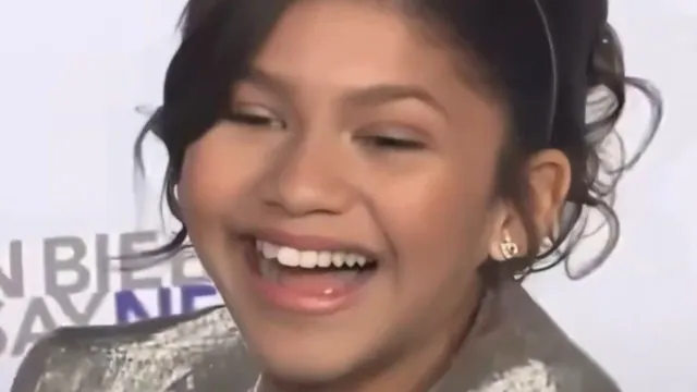 Zendaya Laughing at "Never Say Never" Premiere meme card