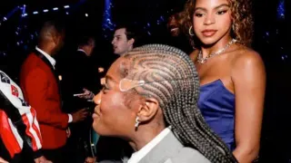 Blue Ivy Looking at Doechii meme card, common rarity