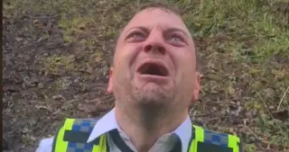 British Cop Screaming at the Sky (Lewis Saunderson) meme card, common rarity