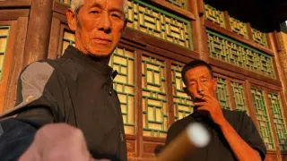Chinese Man Offering A Cigarette meme card, common rarity