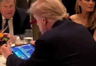 Donald Trump Watching on His iPad meme card, common rarity