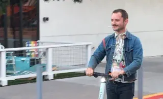 Elijah Wood On a Scooter meme card, common rarity