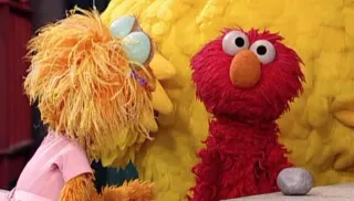 Elmo vs. Rocco meme card, common rarity