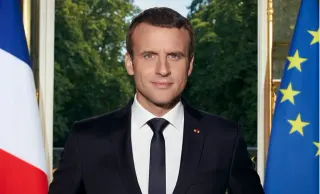 Emmanuel Macron's Official Portrait Photoshop Battle meme card, common rarity