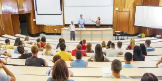 High School Teacher vs. College Professor meme card, common rarity