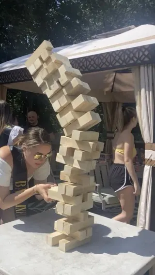 Jenga Girl meme card, common rarity