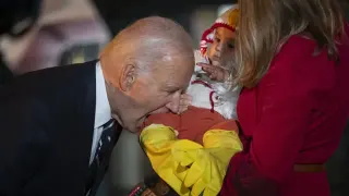 Joe Biden Biting Baby meme card, common rarity