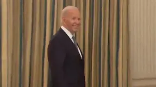 Joe Biden's Evil Smirk meme card, common rarity