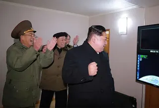 Kim Jong-un Watching Television meme card, common rarity