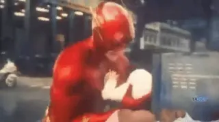 The Flash Microwaving a Baby meme card, common rarity