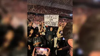 Travis I'm Pregnant Sign meme card, common rarity