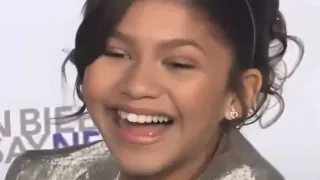 Zendaya Laughing at "Never Say Never" Premiere meme card, common rarity